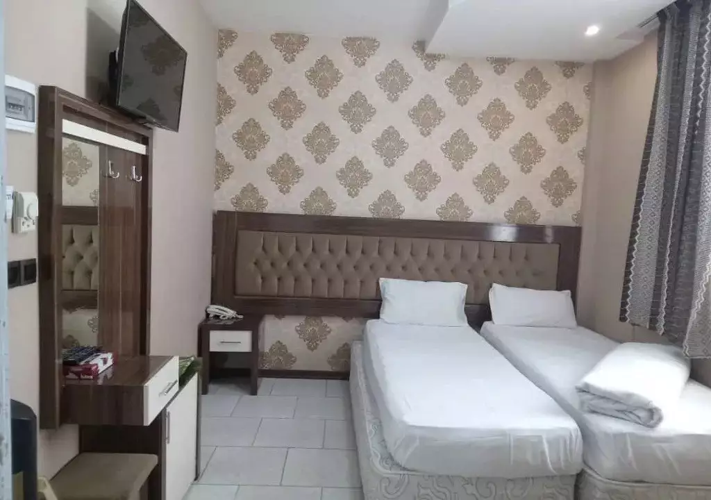 اتاق مسافرخانه هرمس مشهد